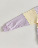 Lavender and yellow Quarter zip jumper  on a white background