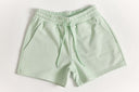 Light green shorts on a white background